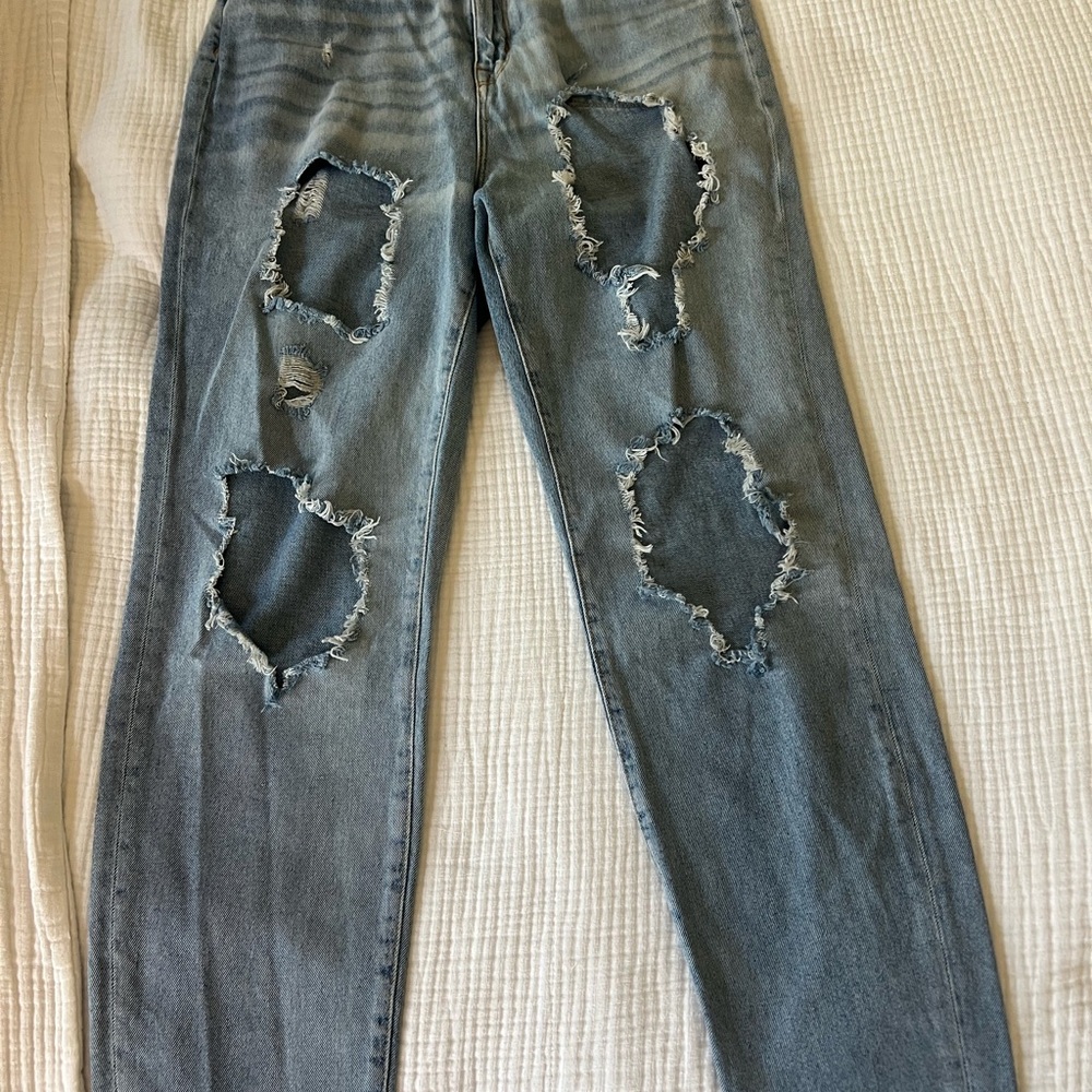 Distressed Blue Jeans